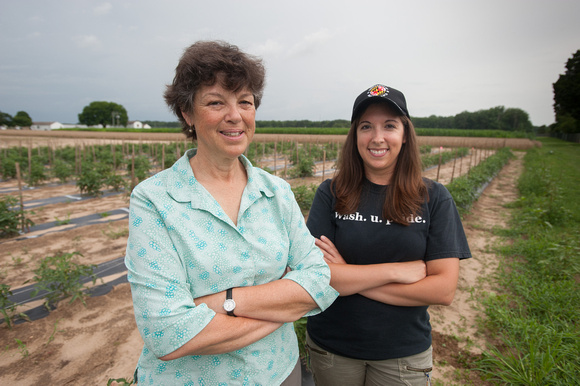 Kate Everets and post doc with tomato plants at LESREC